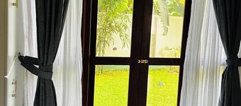 Nature Meets Comfort – 2BR Modern Stay Near Hikkaduwa Shores