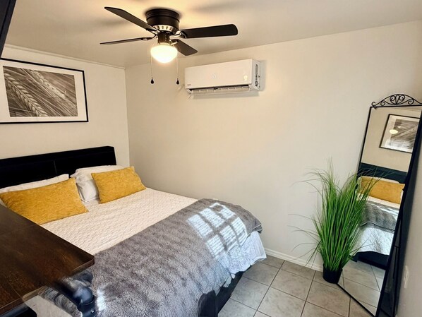 1 bedroom, desk, iron/ironing board, travel crib