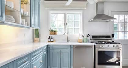 Peaceful Apartment with Waterview and Patio, Walk to Beach!