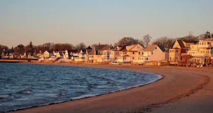 Peaceful Apartment with Waterview and Patio, Walk to Beach!