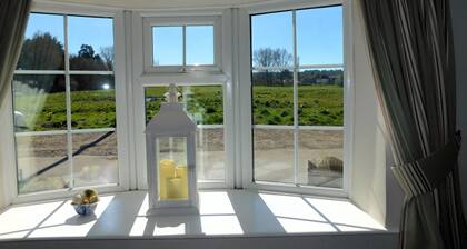 73 Beeston Common -  traditional brick and flint end terrace cottage has been renovated.