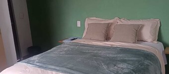 Comfortable room with private bathroom next to plaza candiles in Querétaro