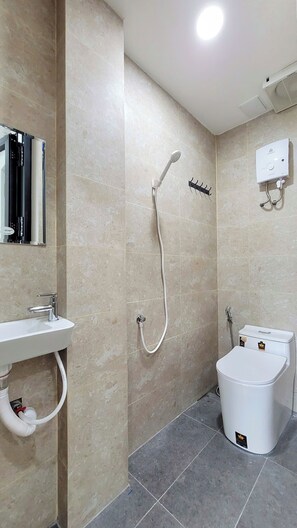 Standard Double Room, 1 Double Bed, City View | Bathroom | Shower, hair dryer, slippers, towels