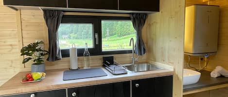 Fridge, stovetop, toaster, cookware/dishes/utensils