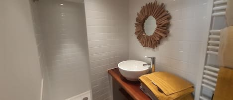 Shower, hair dryer, towels, toilet paper