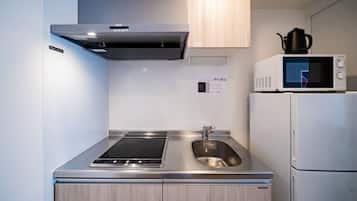 Fridge, microwave, stovetop, cookware/dishes/utensils