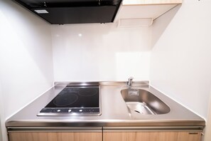 Apartment, Non Smoking (204) | Private kitchen | Fridge, microwave, stovetop, cookware/dishes/utensils - PRIME Asakusa by Tranova (Tokyo)