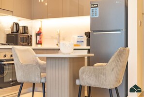 Fridge, microwave, oven, coffee/tea maker