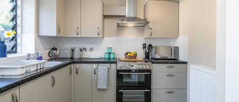 Microwave, oven, cookware/dishes/utensils