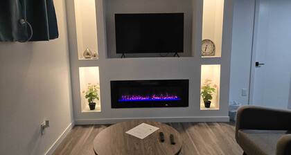 Cozy private bsmt suite |Bonavista |Fireplace |Workspace & nature-inspired decor