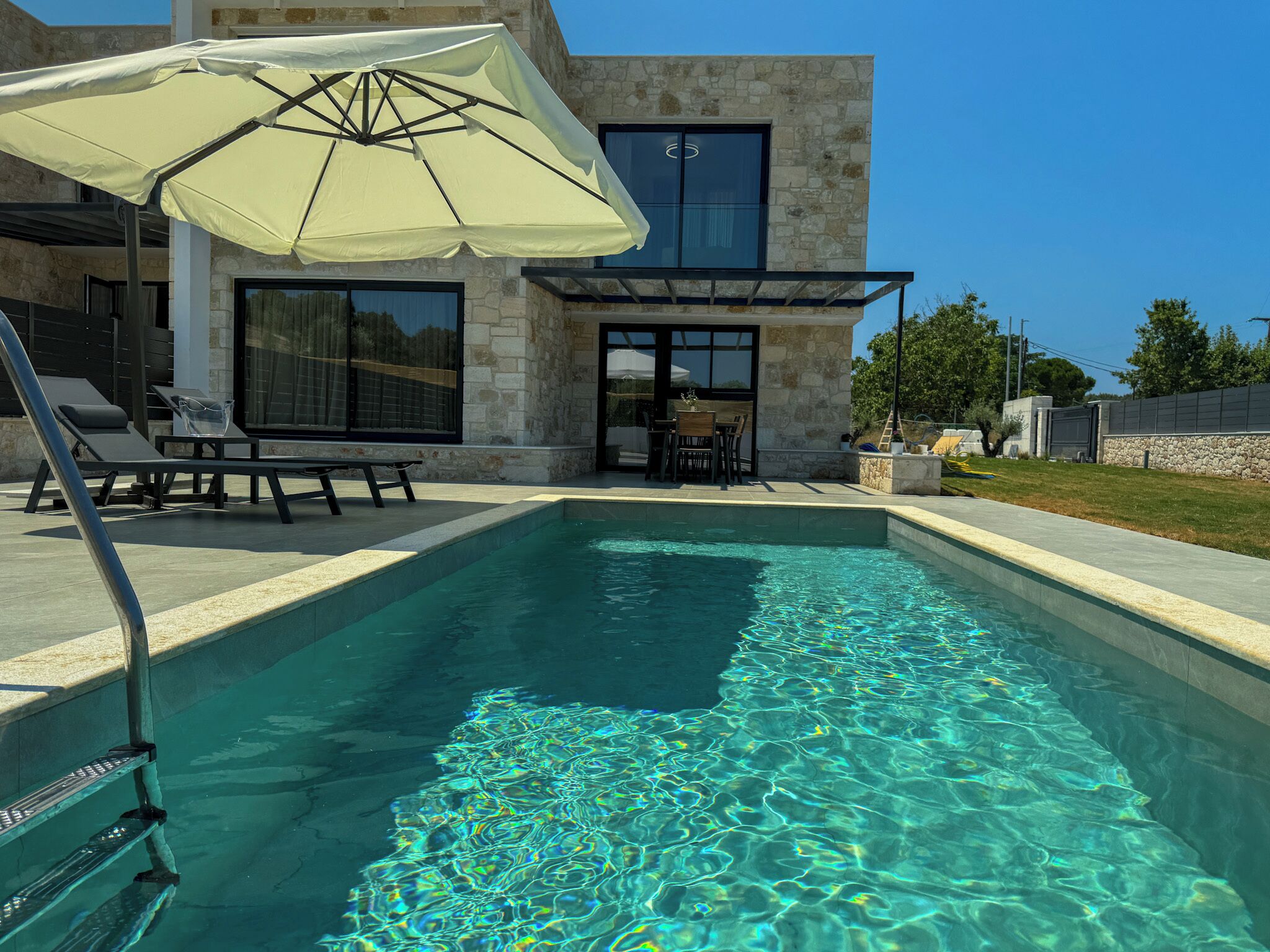 Seasonal outdoor pool, pool umbrellas, sun loungers