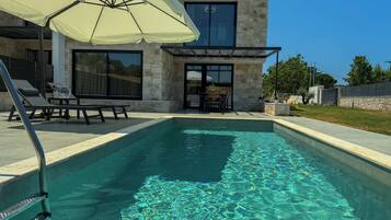 Outdoor pool, pool umbrellas, pool loungers
