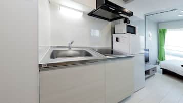 Apartment, Non Smoking (403) | Dapur peribadi | Peti sejuk, ketuhar gelombang mikro, dapur