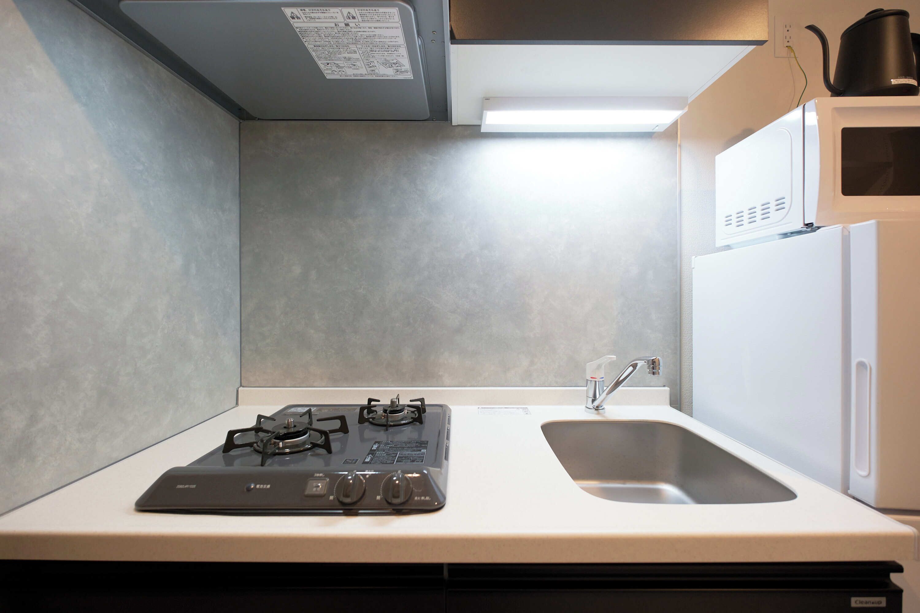 Fridge, microwave, stovetop, cookware/dishes/utensils