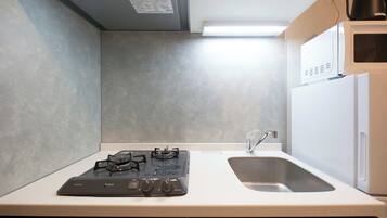 Fridge, microwave, stovetop, cookware/dishes/utensils