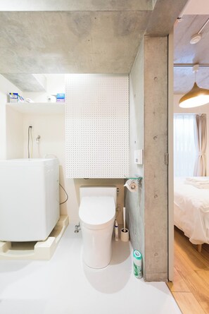 Hair dryer, bidet, towels, soap