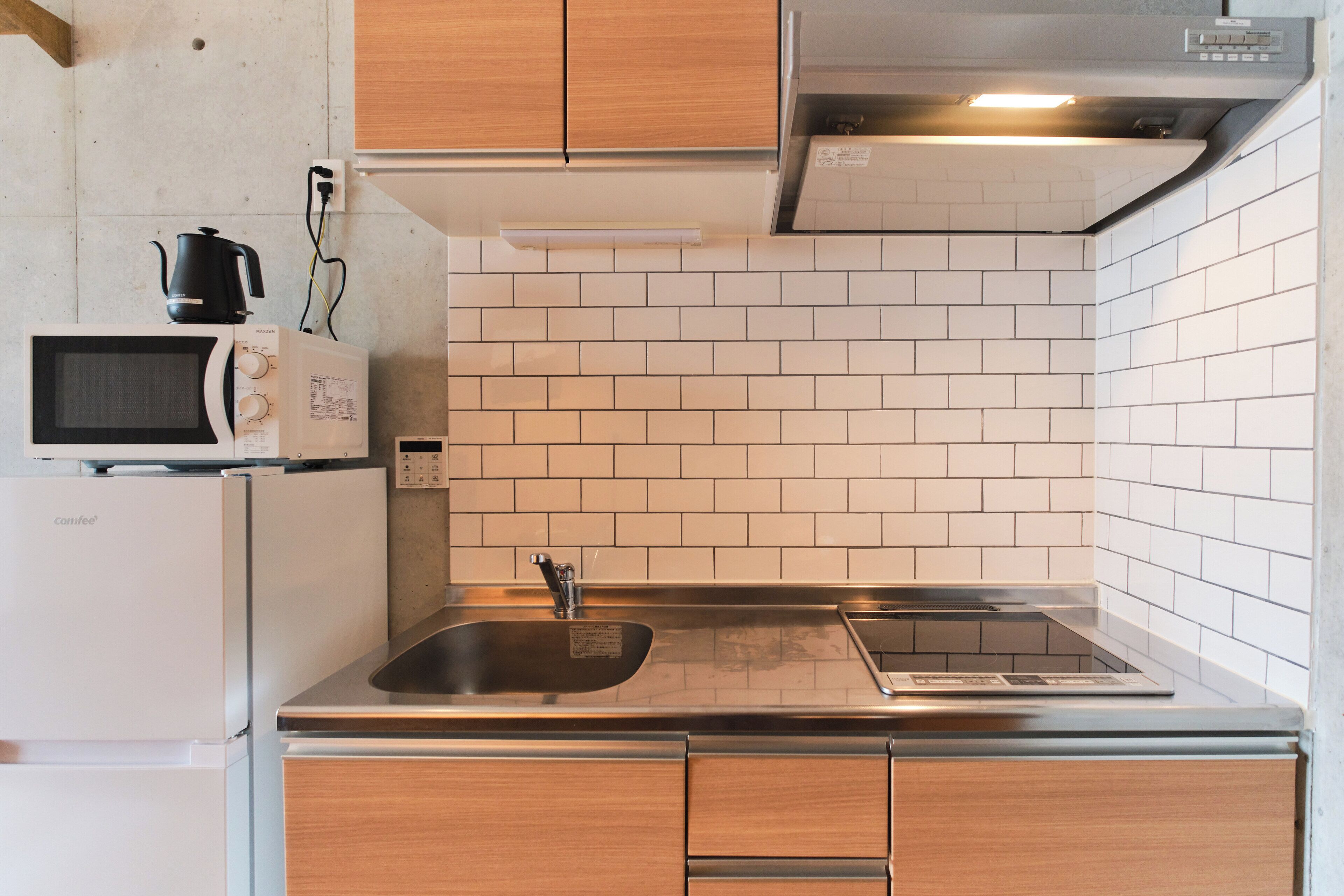 Apartamento, para não fumantes (503, 3 people) | Cozinha privada | Geladeira, micro-ondas, cooktop, talheres/pratos/utensílios de cozinha