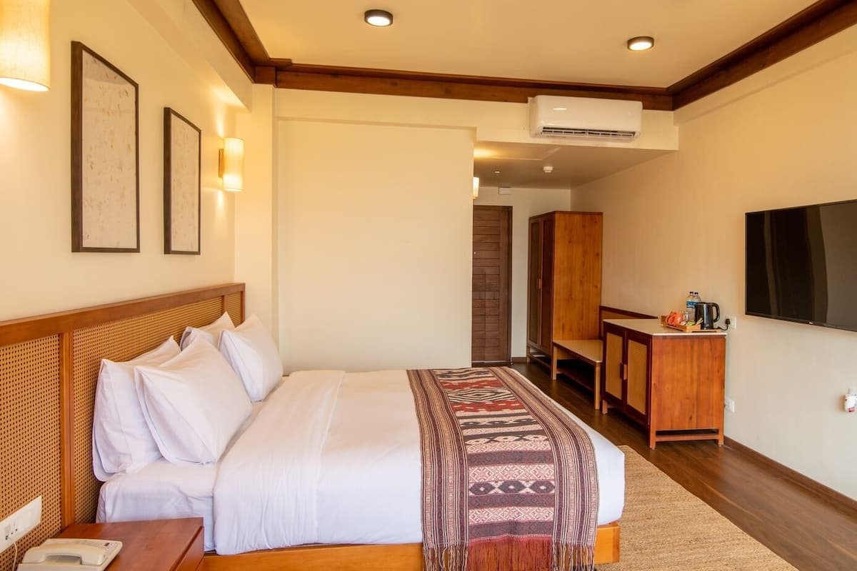 Deluxe Double Room, 1 King Bed, Balcony, Valley View | Premium bedding, minibar, in-room safe, blackout curtains