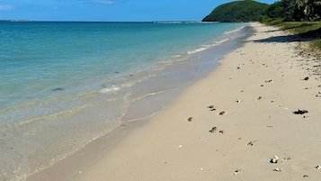 On the beach, sun loungers