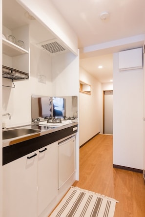 Dobbeltværelse - ikke-ryger - tekøkken | Privat køkken | Køleskab/fryser i fuld størrelse, mikrobølgeovn, kogeplade