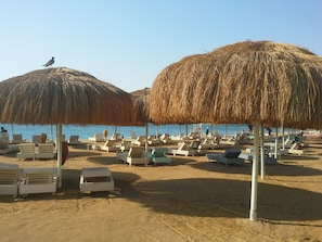 Beach nearby, sun-loungers, beach towels