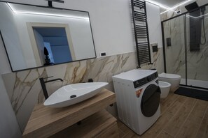 Shower, jetted tub, hair dryer, bidet