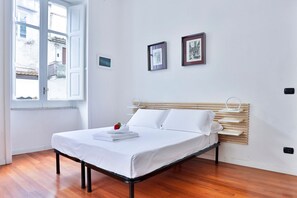 2 chambres, fer et planche à repasser