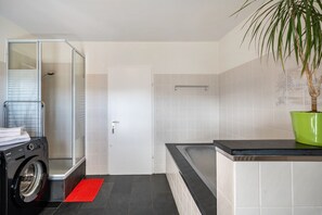 Shower, hair dryer, towels