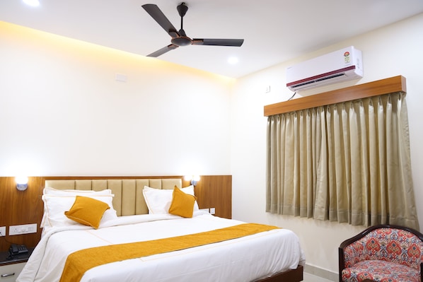 Egyptian cotton sheets, premium bedding, soundproofing, free WiFi - Nanda Mohan Residency (Tirupati)