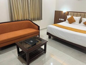 Egyptian cotton sheets, premium bedding, soundproofing, free WiFi - Nanda Mohan Residency (Tirupati)
