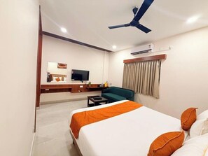 Luxury Room | Egyptian cotton sheets, premium bedding, soundproofing, free WiFi - Nanda Mohan Residency (Tirupati)