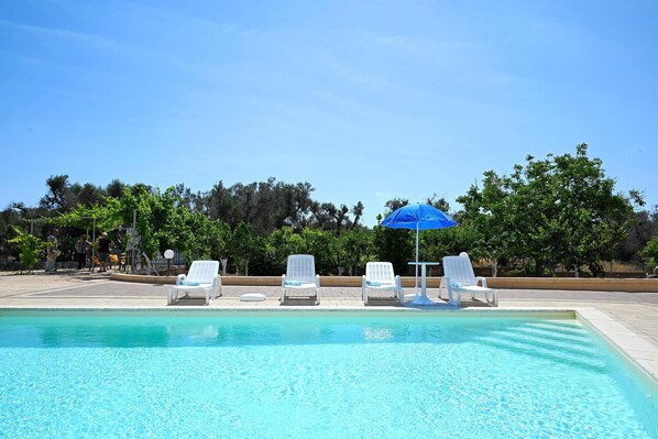 Seasonal outdoor pool, pool umbrellas, sun loungers