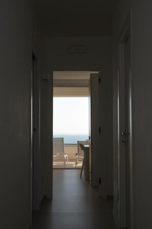 Superior Suite, Sea View | Desk, laptop workspace, blackout drapes, soundproofing