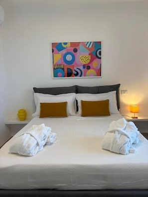 Double Room, Partial Sea View | Desk, laptop workspace, blackout curtains, soundproofing