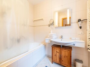 Bathtub, hair dryer