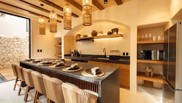 Fridge, microwave, stovetop, coffee/tea maker