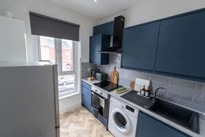 Refrigerador, microondas, horno, placa de cocina