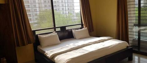 Family Apartment, 3 Bedrooms, Balcony | Laptop workspace, blackout drapes, iron/ironing board, free WiFi