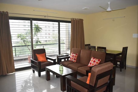Family Apartment, 3 Bedrooms, Balcony | Living area | 36-inch Smart TV with satellite channels