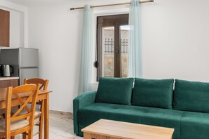 Deluxe-studiolejlighed - flere senge - balkon - byudsigt | Opholdsområde