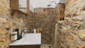 Deluxe Studio, Balcony, City View | Bathroom | Shower, rainfall showerhead, designer toiletries, hair dryer