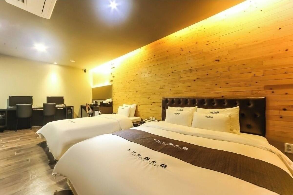 Chambre avec lits jumeaux | Literie hypoallergénique, décoration personnalisée