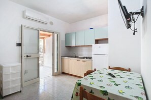 Fridge, stovetop, cookware/dishes/utensils