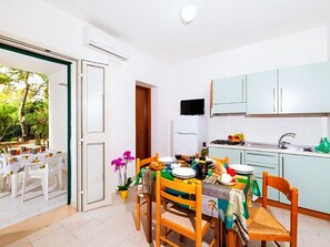 Fridge, stovetop, cookware/dishes/utensils