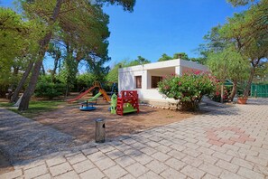 Children’s area - Apartment 'Sabbia D'oro' with Shared Pool and Wi-Fi (Scialara)