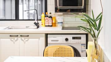 Suite, 1 Double Bed | Private kitchen | Fridge, paper towels, dining tables