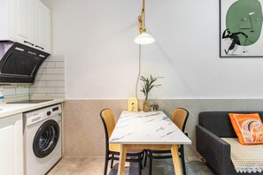 Suite, 1 lit double | Salle de séjour