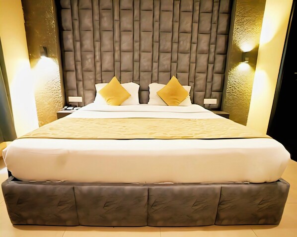 Habitación individual Deluxe | Escritorio, wifi gratis y ropa de cama