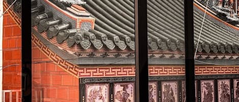 A traditional Chinese architectural style with intricate designs and a tiled roof.