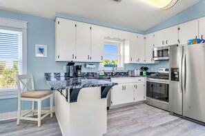 Microwave, dishwasher, coffee/tea maker, toaster